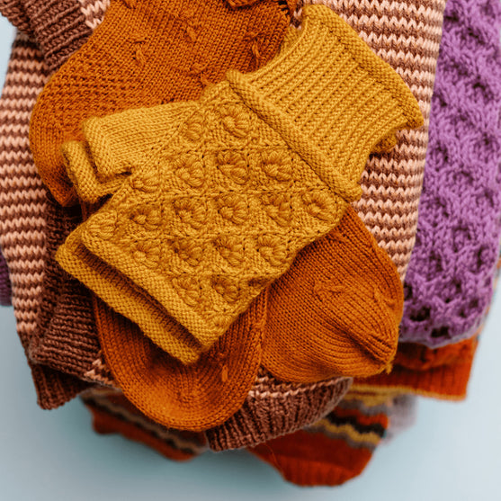 Kvitka - Textured Flower Mittens
7