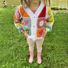 

Joysie - Children’s Cardigan
5