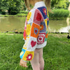 

Joysie - Children’s Cardigan
4