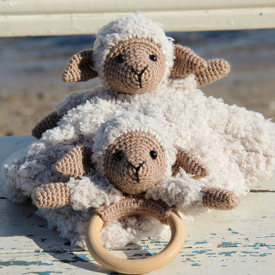 Chanel on cosy blanket and wooden ring