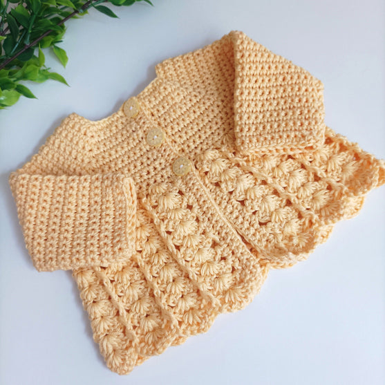 

Shell - Children’s Cardigan
2