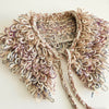 

Den Glade Krave - Decorative collar in loop stitch
2