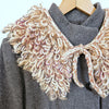 

Den Glade Krave - Decorative collar in loop stitch
3