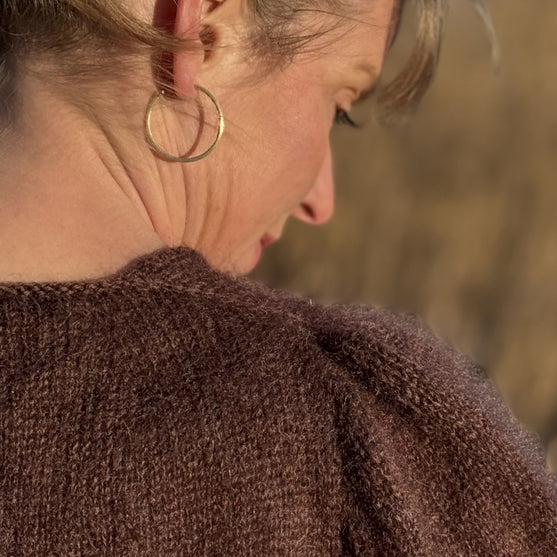 

Kastanje - Sweater
2