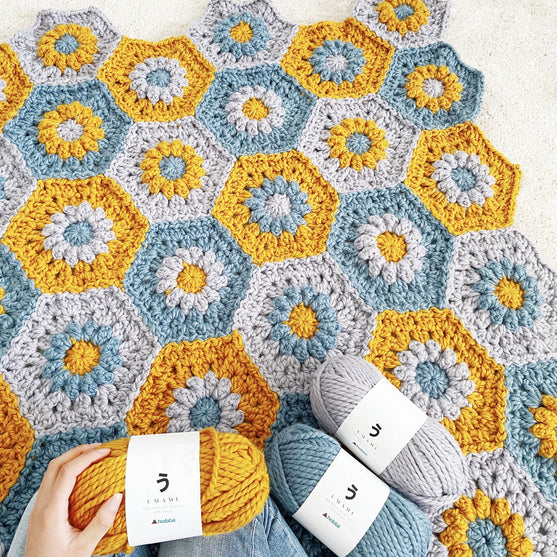 

Oopsie Daisy Hexagon - Blanket
3