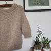 

Suri – Sweater
11
