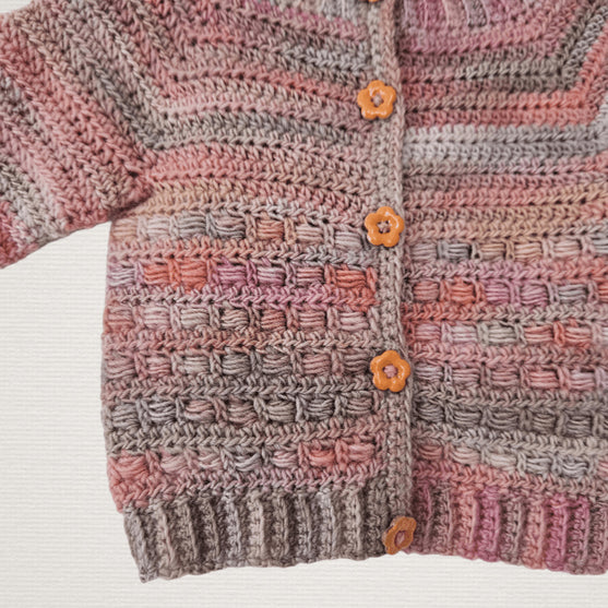 

Coral - Children’s Cardigan
5