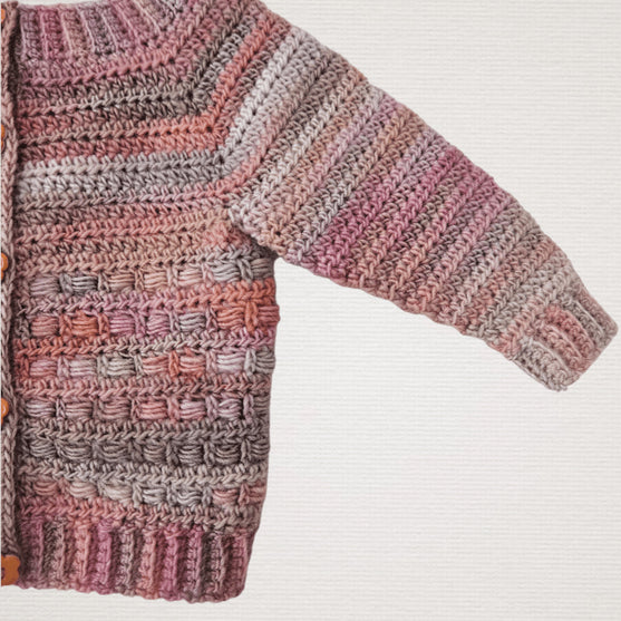 

Coral - Children’s Cardigan
6